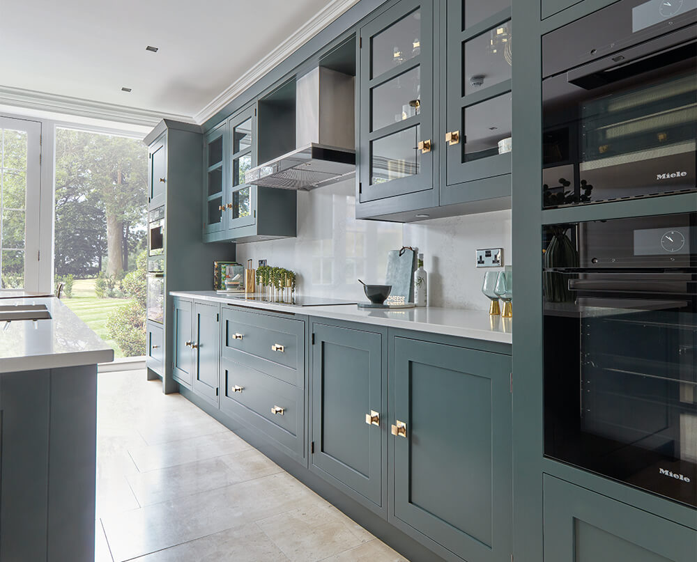 Tom Howley green modern kitchen. 