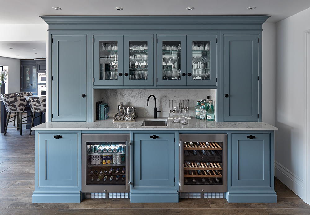 Tom Howley blue painted bespoke bar area. 