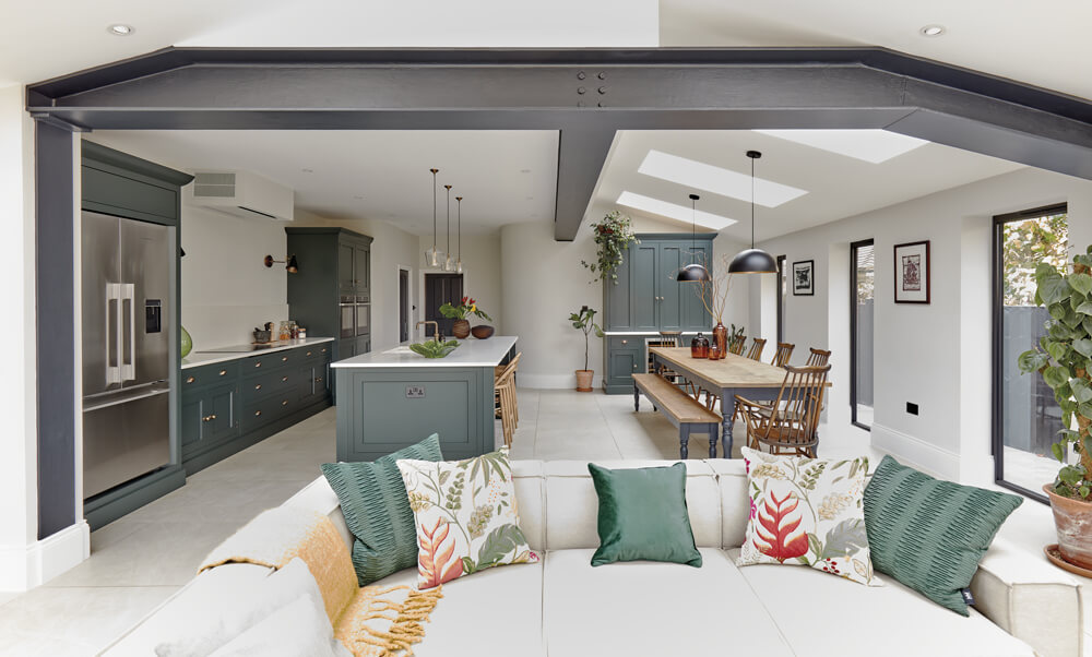 Tom Howley open plan green kitchen.