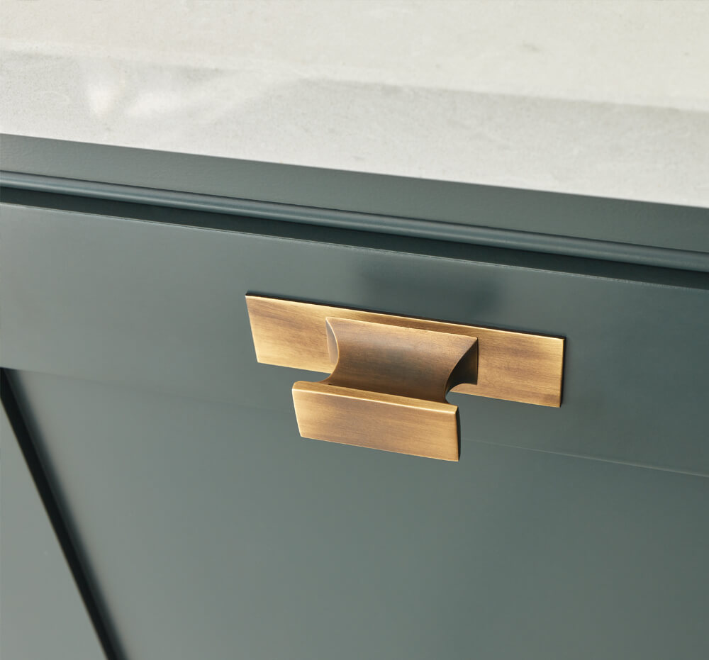 Bespoke brass kitchen handles.