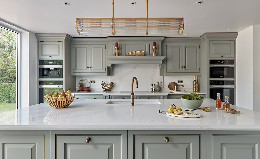 2024 kitchen trend - earthy green painted cabinetry. 