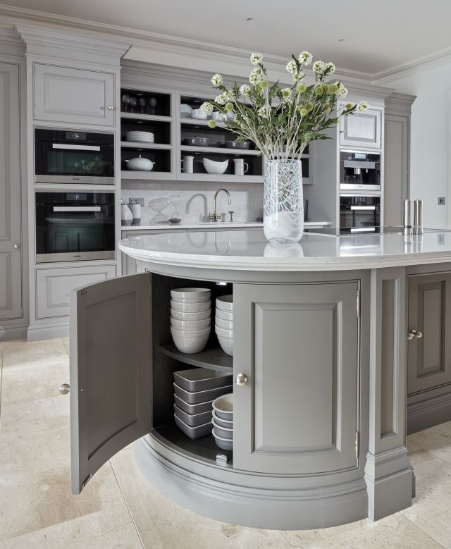 Beyond practicality, curved cabinetry can add a touch of softness to a space. It's a subtle shift away from the sharp lines of traditional kitchens, creating a more relaxed and flowing space.

In a recent issue of @period_living, Creative Design Director Tom Howley highlights a key benefit of curved island cabinetry, specifically in smaller kitchens: "If space is tight, a curved island helps create wider walkways and maximise the footprint without sacrificing storage or workspace."

Discover more shaker style kitchen designs in our latest brochure - request your free copy via the link in our bio.