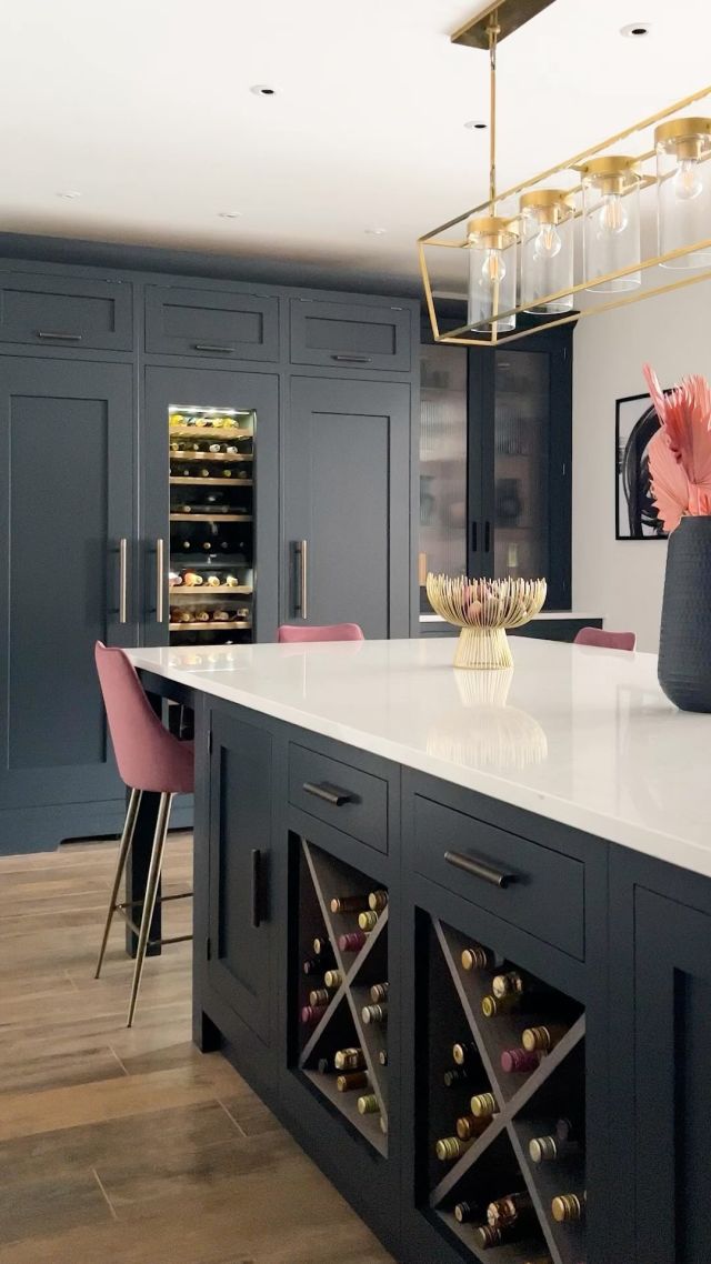 Discover a space that will intrigue and inspire you.

From the dramatic Nightshade cabinetry to the unexpected pops of pink personality, every detail in this kitchen whispers an invitation to gather, create, and connect.

Explore the whole project and all its design details on our blog - link in bio.

-

#tomhowley #kitchendesign #pinkkitchen #home #interiors #interiordesign #kitchen #colourfulhome #walkinpantry #pinkandblack #pinkhome #pinkinteriors #interiordecor #darkinteriors #moodyinteriors #kitchenstorage #kitchenisland #reededglass #appliances