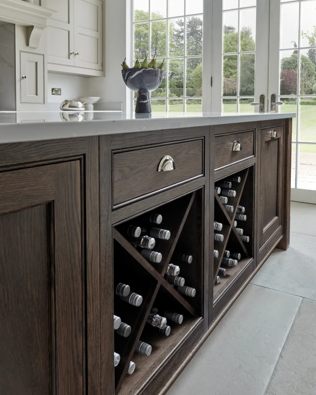 Mixing gently aged timber cabinets with crisp, contemporary fittings creates a layered, lived-in look that's effortlessly stylish.

In this design, subtle contrasts, from the warmth of Tudor Oak to the sleekness of chrome taps and contemporary worktops, strike the perfect balance that feels both grounded and current.

Explore more inspiring kitchen projects in our latest brochure – link in bio.

-

#tomhowley #kitchendesign #luxurykitchendesign #kitcheninspo #designdetails #shakerkitchen #interiordesign #kitchendetails #oakkitchen