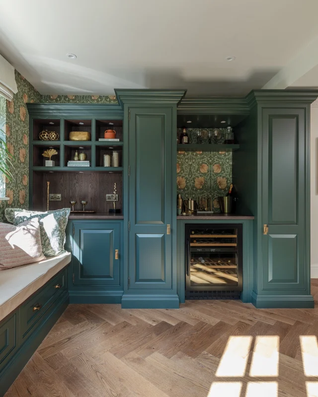 Wallpaper is a beautiful way to bring subtle pattern and personality into a kitchen, especially in areas like a boot room, bar area, or breakfast nook.

In this home, a William Morris botanical wallpaper adds a subtle touch of pattern behind the bespoke cabinetry, bringing depth, contrast, and a gentle softness to the space.

Our tip? Keep the colour palette cohesive with your cabinetry and use wallpaper to layer interest without overwhelming the space.

-

#kitchenwallpaper #designdetails #kitchenpattern #kitchenstyling #homedecor #interiorinspiration #tomhowley #moodyinteriors #interiordecor #homebar