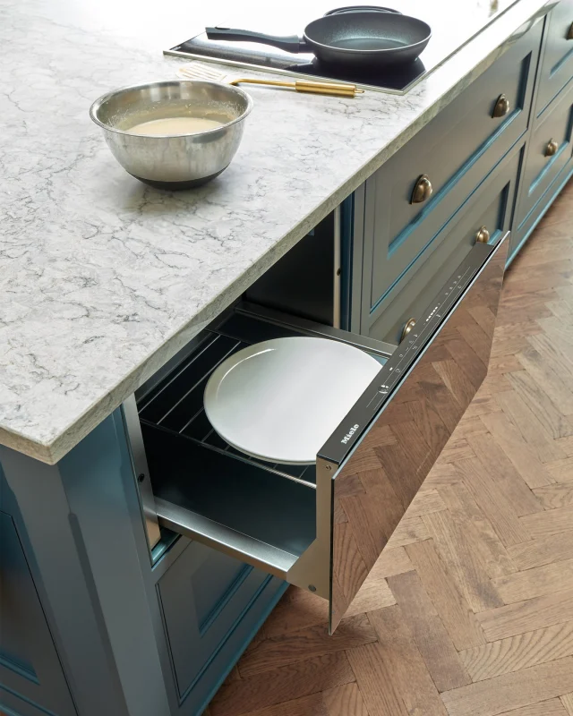 Pancake Day in a family home is rarely quick. Someone’s always waiting for the next batch, someone else is asking if theirs can be extra crispy, and the kitchen slowly fills with people hovering rather than sitting.

In this project, the kitchen was designed to make those long, drawn-out cooking moments feel easy and sociable. The induction hob wipes clean in seconds between flips, while a warming drawer keeps pancakes hot so no one has to eat in shifts. Prep was planned in advance too, with space to mix, store and chill batter in the fridge, keeping surfaces clear once the cooking starts.

The island is the real hero. With informal seating built in, it means you can stand at the hob, flipping pancakes, while everyone else gathers close.

What’s your favourite pancake topping - let us know in the comments below?

-

#tomhowley #pancakeday #pancakes #bespokekitchen #kitchenisland #socialkitchen