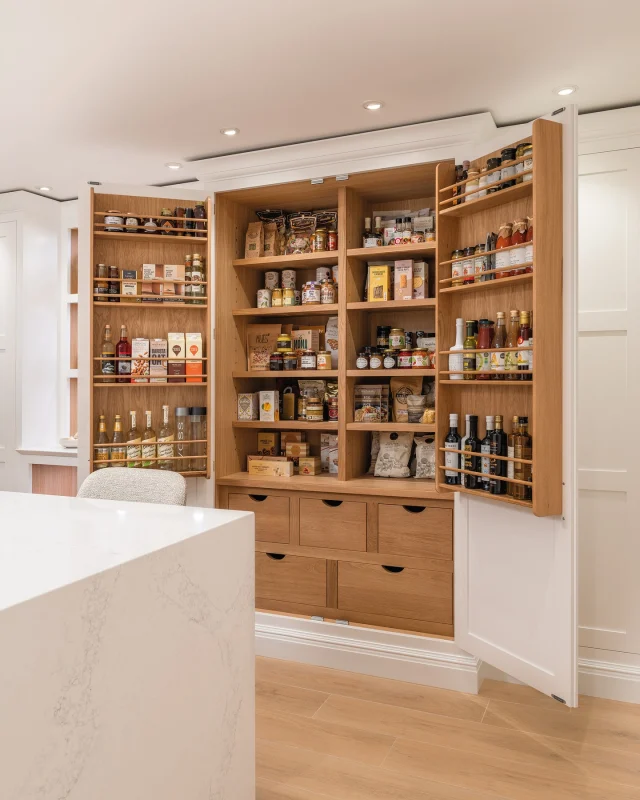 We have always believed that a beautiful kitchen is one that stays tidy without you having to fight it. It’s about the hidden logic.

In this Butler design, the heavy lifting happens behind these double doors. A pantry like this is a game-changer because it keeps your worktops clear for what actually matters: cooking. We’ve used integrated door racks for those grab-and-go spices and deep drawers for the heavier ingredients, so you’re never digging around in the dark.

Designer's tip: When planning your storage, always think about your zones. Keep your cookware by the hob and your bins near prep areas. When everything has a dedicated home, the whole energy of the room shifts from chaotic to calm.

Follow the link in our bio to explore this project.

#tomhowley #kitchenstorage #pantry #kitchenorganisation #kitchendesign