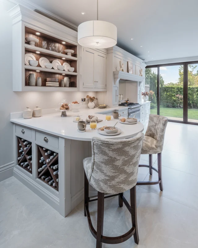Not every kitchen needs sharp lines.

This peninsula softens the space with its curved shape, creating a natural spot to sit, gather, and chat.

It works hard behind the scenes, too, with plenty of hidden storage built in.

#tomhowley #kitchenisland #interiordesign #kitchenstorage #storagehacks