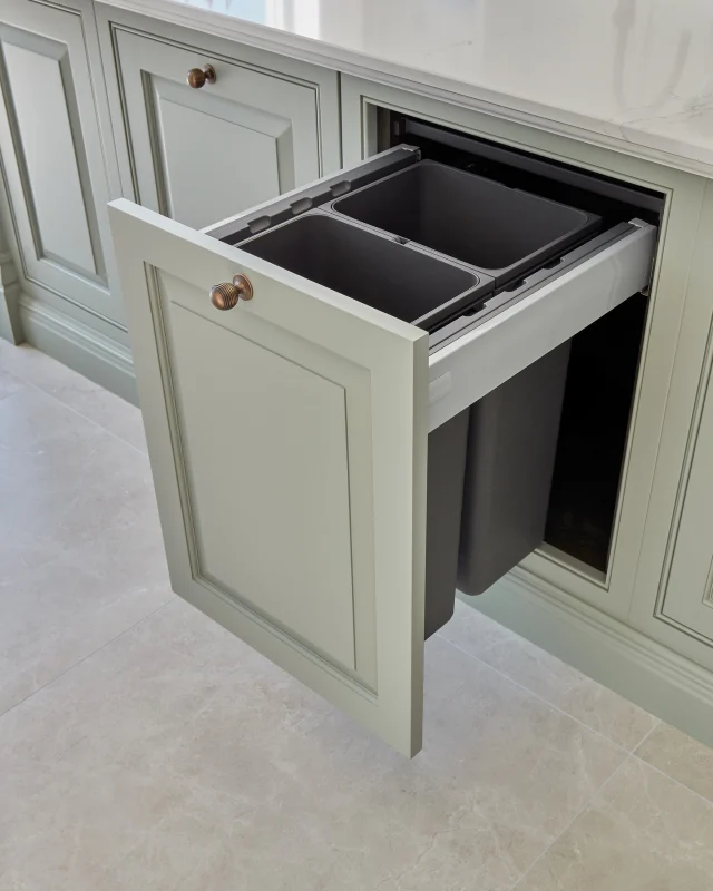 Maintaining the clean aesthetic of your kitchen also comes down to how you manage waste and recycling. 

With hidden kitchen storage, even these practical necessities are handled with finesse. Pull-out recycling bins with divided compartments make it easy to sort waste efficiently. These space-saving systems can be concealed under the sink or within an island, keeping your kitchen pristine.

Discover how our designers can unlock clever hidden storage in your kitchen. Visit one of our nationwide showrooms today - find your nearest via the link in our bio.