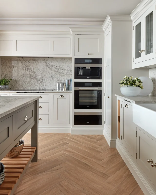 The main storage run in our St Albans Butler kitchen is designed with balance and ease in mind.

At the centre, the induction hob is framed by deep drawers, keeping everyday essentials close to hand. Banked appliances either side add symmetry, while making the most of every inch of storage.

It’s a considered layout that makes the kitchen feel calm, practical and effortless – ready for everyday family life, as well as everything that comes with it.