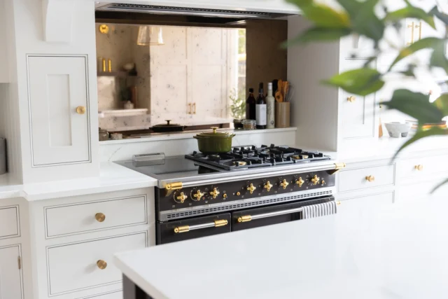 A closer look at the cooking run in our new Brentwood display.

Inspired by the everyday lives of our clients and a desire to create a personal, lived-in space, the display feels less like a perfect showroom piece and more like a real home.

It's centred around our classic Hartford cabinetry, painted in the warm tones of Anise and paired with contrasting Tudor Oak timber for a more organic feel. A beautiful feature is the antique mirrored splashback, which sits behind a chocolate brown @lacancheuk range cooker with a Westin extractor above, together forming a striking, sociable focal point.

Visit the display in our Brentwood showroom. You can find all of our showroom details via the link in our bio.

#tomhowley #brentwoodshowroom #kitchendesign #hartfordkitchen #bespokekitchen
