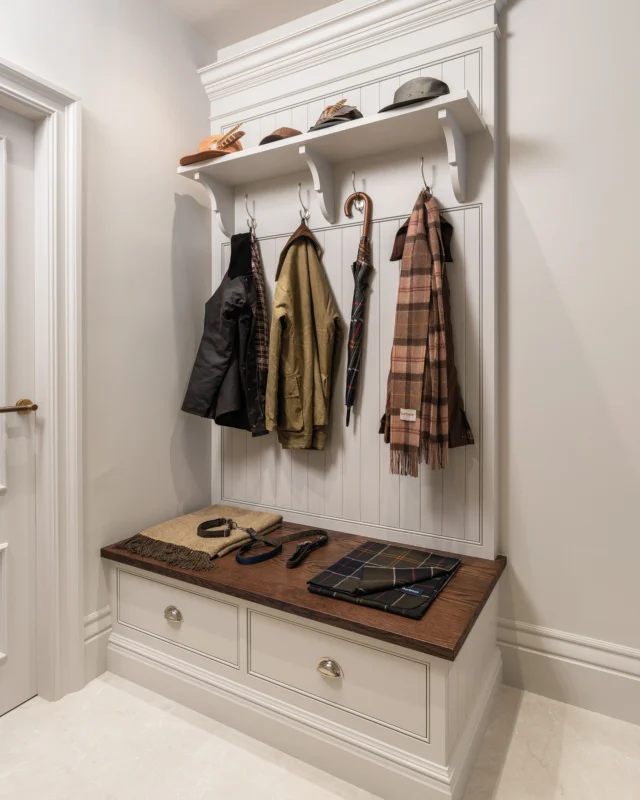 The hallway is often the first place to feel cluttered. Coats, shoes, bags and umbrellas all tend to gather by the front door, just when you want the space to feel calm and welcoming.

A few well-placed storage solutions can make all the difference. Here, a Tudor Oak bench with drawer storage gives you somewhere to sit while taking off your shoes, a bespoke shelf keeps everyday essentials close at hand, and classic coat hooks give coats, bags and umbrellas a proper home.

Want to make more of your hallway? Book a complimentary design visit — link in bio.

#tomhowley #hallwaystorage #bootroom #homestorage #interiordesign